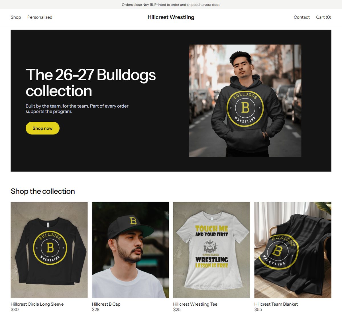 Example store for the Hillcrest Bulldogs in a clean white style with black and gold, showing a long sleeve, a cap, a tee and a blanket