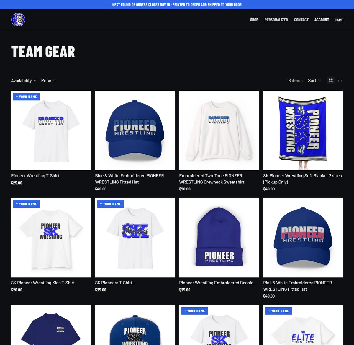 The Pioneer Spirit Shop for Simon Kenton wrestling: a dark storefront with a grid of blue and white team tees, hats, a crewneck and a blanket